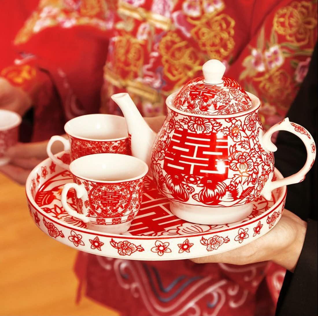 Traditional red double-happiness tea set for a Chinese wedding tea ceremony in Singapore